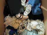 a box full of clothes and a laptop in it