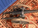 an old machine that is sitting on a rug