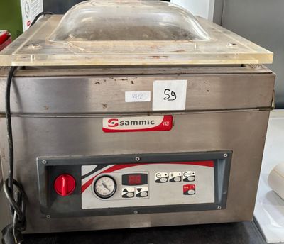 a machine that is sitting on a counter in a kitchen