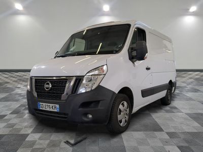 the white van is parked on a checkered floor in a room