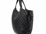 a close up of a black bag on a white background