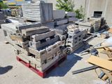a pile of concrete blocks sitting on a pallet