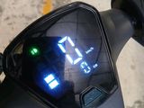 a close up of a motorcycle ' s rear view mirror