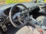 the interior of a car with a steering wheel, dashboard, and dashboard controls