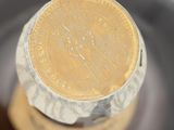 an image of a close up of a bottle of wine