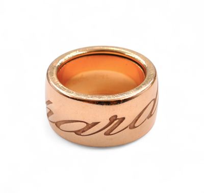 a close up of a gold ring with a name engraved on it
