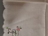 a white handkerchief with a design on it