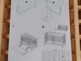 a drawing of a baby crib and a crib with a crib underneath it