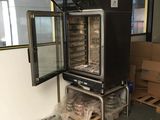 an image of a commercial oven in the middle of a room