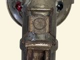 an old fire hydrant with a clock on the top of it