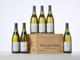 a group of six bottles of wine in a wooden box