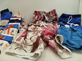 a pile of clothing that is on a table