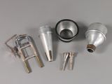 four different types of pipe fittings on a table
