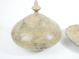 two bowls that are sitting next to each other on a table