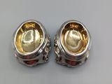 pair of silver and gold plated cuff rings