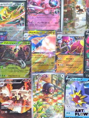 a lot of pokemon cards that are on the table