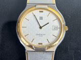 an image of a close up of a wrist watch on a table