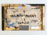 a sign on the wall that says mark nutraki