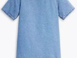 a baby girl ' s denim dress with ruffle hems