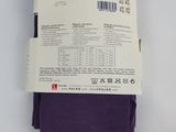 two pairs of purple socks on a white surface with a price tag