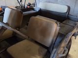 an image of a car with two seats in the back of it