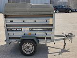 an image of a trailer parked in a parking lot