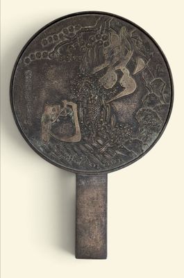 a mirror with a picture of a man on a horse on it