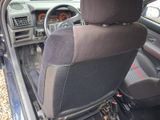 the interior of a car with a steering wheel and a dashboard