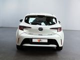 the rear of a white toyota c - hr in a white room