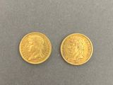 two gold sovereigns, one of which is a sovereign and the other of which is a sovereign