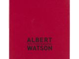 un livre rouge avec des lettres noires sur fond blanc