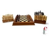 a lot of chess pieces that are sitting on a table
