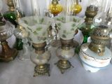 a lot of glass vases that are sitting on a table