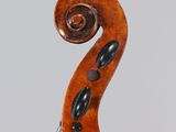 an old violin with a wooden back and a long neck