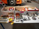 a table with a lot of assorted items on it