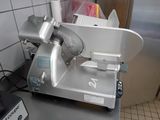 a machine that is sitting on a counter in a kitchen