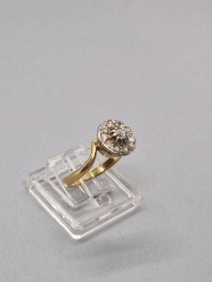 Bague "fleur" en or 585 mm (14 K) et platine 850 mm sertie d…