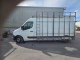 a white van that is parked in a parking lot