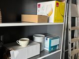 a ladder that is leaning against a wall in a room