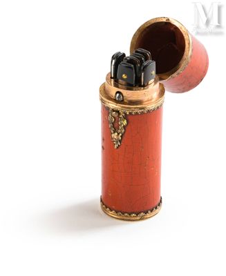 a lighter that is sitting on a white surface