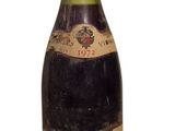 a bottle of wine that is sitting on a table