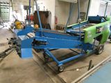an image of a machine that is working on a piece of machinery