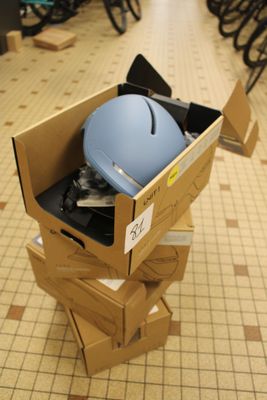 a cardboard box with a computer in it on the floor