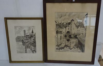 two framed pictures on the wall of a room
