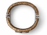 a close up of a bracelet with a metal clasp on a white background