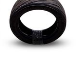 a close up of a tire on a white background
