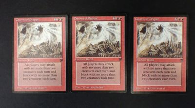 three cards with a picture of a horse on them on a table