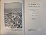 an open book with a picture of a city in it