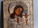 une image représentant Jésus tenant une croix et un crucifix