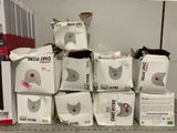 many boxes that are stacked on a shelf in a store